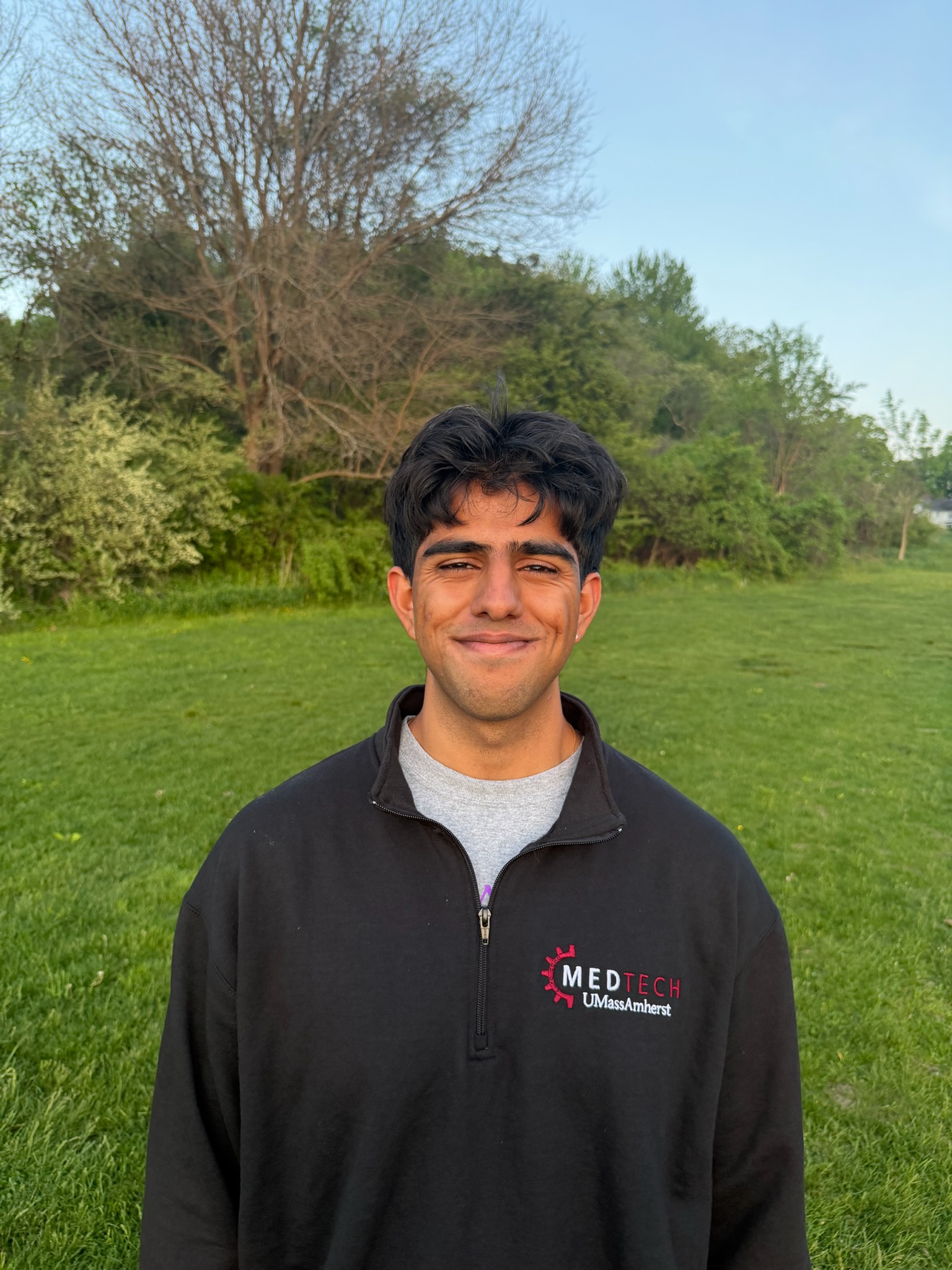 Anitez Gautam in his UMass MedTech jacket